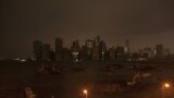 The skyline of lower Manhattan sits in darkness after a preventive power outage in New York Oct. 29, 2012. 