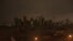 The skyline of lower Manhattan sits in darkness after a preventive power outage in New York Oct. 29, 2012. 