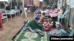  photo- အုန်းဖျံဒုက္ခသည်စခန်းတွင်းကကိုဗစ်ကုသ ရေးဆောင်ကလူနာများ ( CJ)