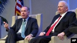 FILE - Wisconsin Assembly Speaker Robin Vos, left, and Senate Majority Leader Scott Fitzgerald speak in Madison, Wis., Feb. 7, 2018. In a joint statement, Vos and Fitzgerald defended the Foxconn incentive package they helped create against charges it cost too much.