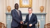 Phillip Jada Natana, South Sudan’s new ambassador to the United States, meets with the Chief of the Protocol of the United States Ambassador Sean P. Lawler (right) at the State Department in Washington. (State Department photo)