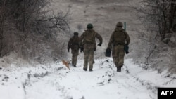 Фото: Українські військові під Бахмутом, 13 грудня 2023 року. Anatolii Stepanov/AFP