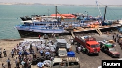 Activities at the sea port in lower Juba regions in Kismayu, Somalia, Feb. 27, 2013