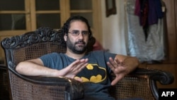 Egyptian activist and blogger Alaa Abdel Fattah gives an interview at his home in Cairo on May 17, 2019. On Sunday, April 24, 2022, the day Egypt released more than three dozen prisoners, a sister of the activist said her brother was on the 22th day of a hunger strike.