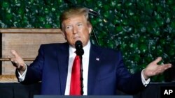 President Donald Trump gestures as he addresses a commemorative meeting of the Virginia General Assembly at Jamestown Settlement on the 400th anniversary of the meeting of the original House of Burgess in Jamestown, Va., July 30, 2019.