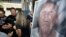 Sacramento County Sheriff Scott Jones, left, talks to reporters about the arrest Joseph James DeAngelo, seen in photo, on suspicion of committing a string of violent crimes in the 1970s and 1980s after a news conference, April 25, 2018, in Sacramento, Calif.