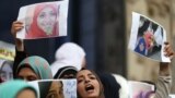 Female relatives of women prisoners shout slogans against the military and the interior ministry at an event called "Release Our Girls" during International Women's Day in front of the Press Syndicate in Cairo, Egypt, March 8, 2016. 