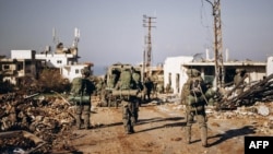 Foto yang dirilis oleh Militer Israel tampak sejumlah tentara dari Brigade ke-11 sedang beroperasi di selatan Lebanon, 16 Januari 2025. (Foto: Militer Israel/AFP)