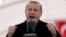 FILE - Turkey's President Recep Tayyip Erdogan gestures as he speaks in Istanbul, Dec, 20, 2016. Erdodan has been seeking broader powers since assuming the presidency in 2014.