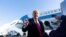 President Donald Trump speaks with reporters before boarding Air Force One Jan. 12, 2021, at Andrews Air Force Base, Maryland, to travel to Texas. 
