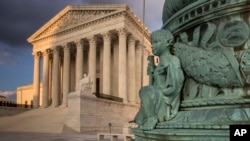 FILE - The U.S. Supreme Court in Washington, at sunset, Oct. 10, 2017.