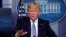 FILE - President Donald Trump speaks about the coronavirus in the James Brady Briefing Room, March 23, 2020, at the White House, in Washington.