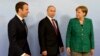 Еммануель Макрон, Володимир Путін та Анґела Меркель на саміті G-20 в Німеччині, 2017р.