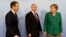 Еммануель Макрон, Володимир Путін та Анґела Меркель на саміті G-20 в Німеччині, 2017р.
