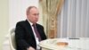 Putin ‘Playing Poker Rather Than Chess,’ Says Former UK Spy Chief