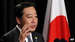 Japanese Prime Minister Yoshihiko Noda speaks during a press conference in Honolulu, November 13, 2011.