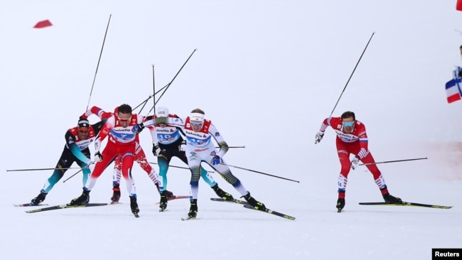 FILE - Emil Iversen of Norway, Oskar Svensson of Sweden and Gleb Retivykh of Russia in action February 21, 2019