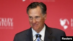 FILE - Former Republican U.S. presidential nominee Mitt Romney pauses and smiles as he delivers a speech criticizing current Republican presidential candidate Donald Trump at the University of Utah in Salt Lake City, Utah March 3, 2016. 