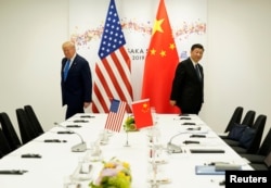 FILE - U.S. President Donald Trump attends a bilateral meeting with China's President Xi Jinping in Osaka, Japan, June 29, 2019.