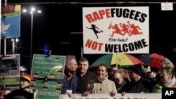 PEGIDA activists rally against the German government's refugee and migrant policies, in Leipzig, eastern Germany, Jan. 11, 2016. 