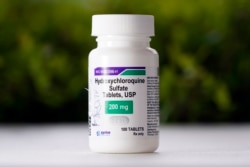 FILE - This April 7, 2020, photo shows a bottle of hydroxychloroquine tablets in Texas City, Texas.