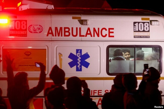 An ambulance carries survivors as rescue operations are underway to rescue trapped workers after a tunnel collapsed, in Uttarkashi in the northern state of Uttarakhand, India, November 28, 2023. (REUTERS/Francis Mascarenhas)