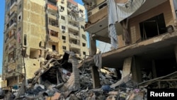 A view shows damaged buildings, in the aftermath of Israeli strikes on Beirut's southern suburbs, amid the ongoing hostilities between Hezbollah and Israeli forces, Lebanon, October 9, 2024.