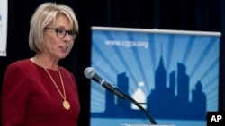 FILE - Education Secretary Betsy DeVos speaks at the Council of the Great City Schools Annual Legislative/Policy Conference in Washington, March 13, 2017. 