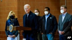 President Joe Biden talks about his administration's response to wildfires, during a visit to Louisville, Colo., Jan. 7, 2022.