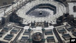 An aerial of the Grand mosque as Muslim pilgrims walk around the Kaaba, the black cube seen at center inside, during the annual hajj pilgrimage, in the holy city of Mecca, Saudi Arabia, Sept. 2, 2017. 