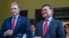 Cambodia National Rescue Party's President Kem Sokha, right, talks to the media as U.S. Ambassador to Cambodia W. Patrick Murphy listens after a welcoming meeting at Kem Sokha's house in Phnom Penh, Cambodia, Monday, Nov. 11, 2019.