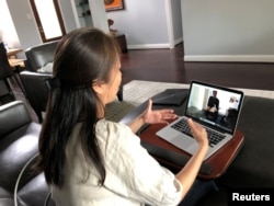 Blogger Mẹ Nấm nói chuyện với phóng viên Reuters qua Skype từ Houston, Texas.