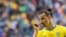 Penyerang Swedia dan kapten tim Zlatan Ibrahimovic bereaksi selama pertandingan sepak bola persahabatan antara Swedia dan Wales. (Foto: AFP)