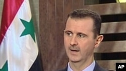 An image grab taken from Syrian state television on August 21, 2011, shows Syrian President Bashar al-Assad speaking on television after the "iftar" meal that breaks the Muslim Ramadan fast.