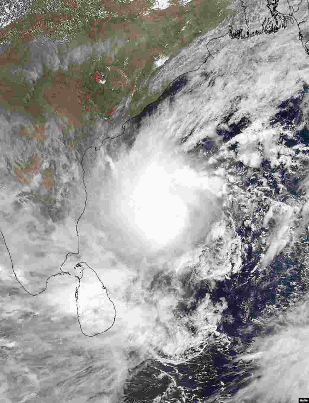 NASA&rsquo;s Aqua satellite captured this visible image of a well-rounded Tropical Cyclone Mahasen in the Northern Indian Ocean on May 15 at 07:55 UTC. (Credit: NASA Goddard MODIS Rapid Response Team)