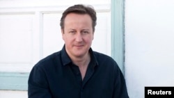 Britain's Prime Minister David Cameron during a holiday on the Spanish Canary island of Lanzarote, April 13, 2014. 