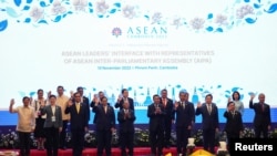 ASEAN leaders pose for a group picture as they meet with representatives of ASEAN Inter-Parliamentary Assembly (AIPA) during the ASEAN Summit in Phnom Penh, Cambodia November 10, 2022.