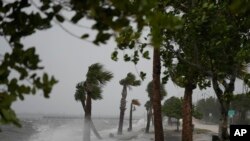 Waves crash on the shoreline along the Jensen Beach Causeway, as conditions deteriorate with the approach of Hurricane Nicole, Nov. 9, 2022, in Jensen Beach, Fla.