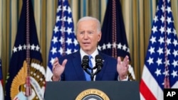 US President Joe Biden speaks in the State Dining Room of the White House in Washington, Nov. 9, 2022.