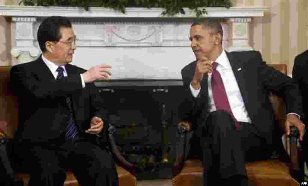 President Barack Obama meets with China's President Hu Jintao, Wednesday, Jan. 19, 2011, in the Oval Office of the White House in Washington. (AP Photo/Evan Vucci)