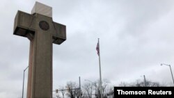 FILE - A concrete cross commemorating servicemen killed in World War I in Bladensburg, Maryland.