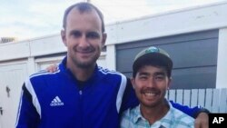 FILE -- American adventurer John Allen Chau, right, stands for a photograph in October with Founder of Ubuntu Football Academy Casey Prince, 39, in Cape Town, South Africa, days before he left for in a remote Indian island of North Sentinel Island.
