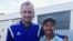 FILE — John Allen Chau, right, stands for a photo in October with founder of Ubuntu Football Academy Casey Prince, 39, in Cape Town, South Africa, days before he left for in a remote Indian island where he was killed
