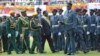 Zimbabwe's President Emmerson Mnangagwa, center, inspects the guard of honour during the celebrations for the country's 38th anniversary of Independence at the National Sports Stadium in Harare, Apr. 18, 2018. 