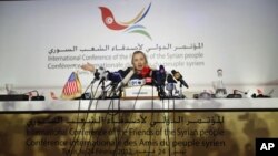 US Secretary of State Hillary Clinton speaks at a news conference following the Friends of Syria Conference in Tunis, Tunisia, February 24, 2012.