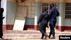 Police members are deployed after gunmen abducted students from the all-boys Government Science school in Kankara, in northwestern Katsina state, Nigeria December 13, 2020. REUTERS/Afolabi Sotunde