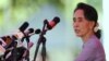 FILE - Myanmar's National League for Democracy Party leader Aung San Suu Kyi is seen speaking to media in Yangon.