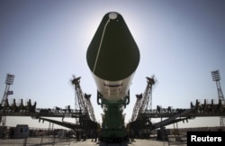 FILE - The Russian Progress-M spacecraft is ready to be lifted on its launch pad at Baikonur cosmodrome, Kazakhstan, July 1, 2015.