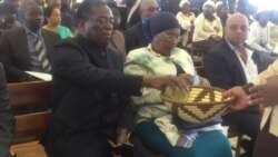 Zimbabwe VP Mnangagwa Giving Alms at Holy Trinity Catholic Church