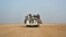 FILE - Nigeriens and third-country migrants head towards Libya from Agadez, Niger, June 4, 2018. 
